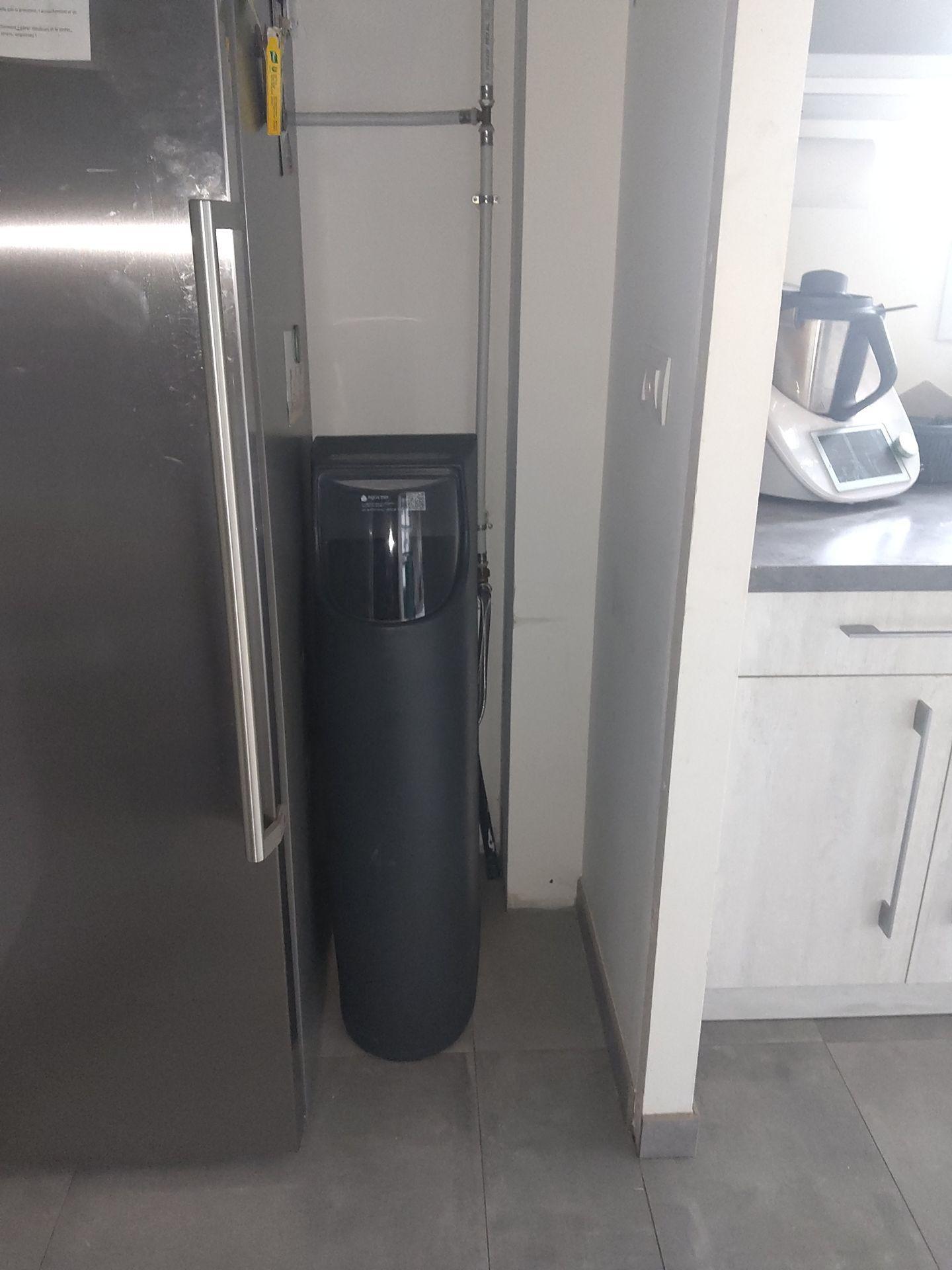 Installation adoucisseur 100 BL + cuisine